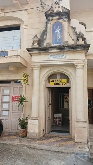 The discreet street entrance to Xerri's Grotto. The cave lies beneath the private family residence above.