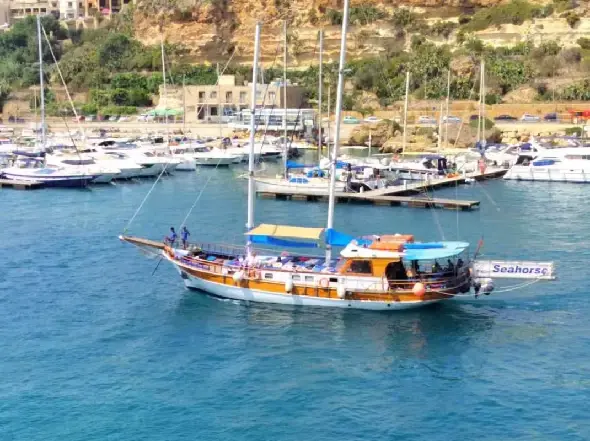 Gozo, Comino & Blue Lagoon Boat Trip Beautiful two-masted boat. Gozo, Comino & Blue Lagoon Boat Trip